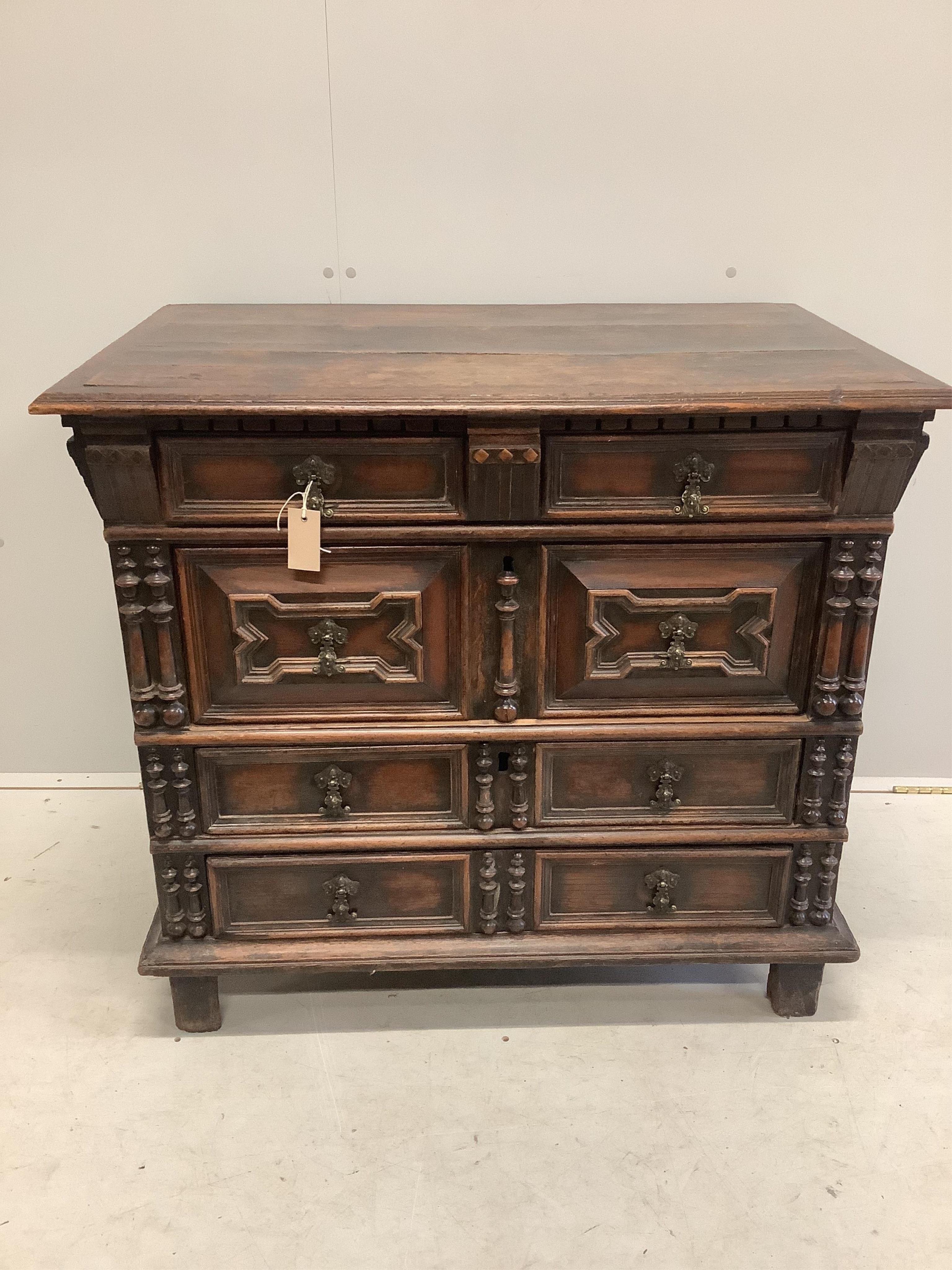 An 18th century oak block front chest of drawers, width 96cm, depth 61cm, height 85cm. Condition - fair to good